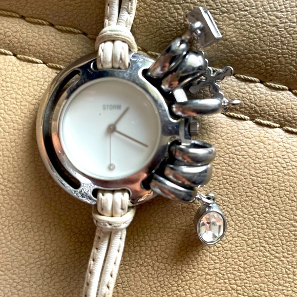 Storm Accessories - Storm watch. White leather strap. Charm bracelet watch. Used